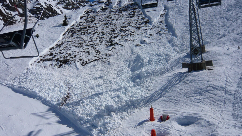 wet snow avalanche falls across the piste in Verbier