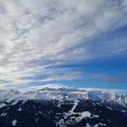 Panoramic winter view from Ruinettes in Verbier looking towards Mont Blanc, showing early-season snow coverage and clear Alpine conditions.