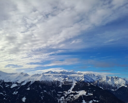 Panoramic winter view from Ruinettes in Verbier looking towards Mont Blanc, showing early-season snow coverage and clear Alpine conditions.