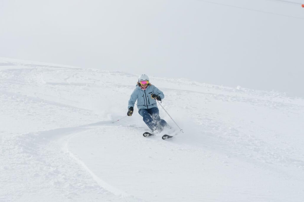 Off Piste Ski Lesson Technique in Verbier Skier practicing controlled turns during off piste ski lesson in Verbier