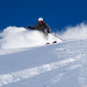 Advanced skier skiing powder snow in Verbier during a private coaching session