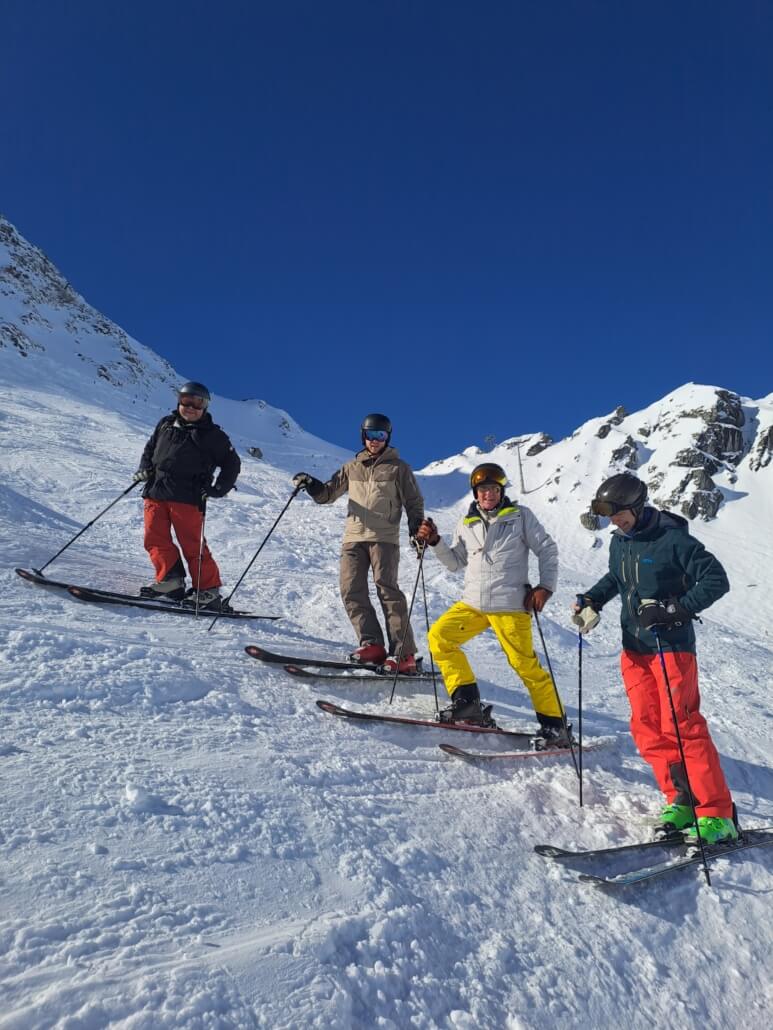 Private ski clients skiing advanced terrain in Verbier with an independent instructor